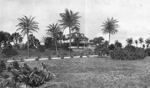 An image of the Charles Newcomb house, formerly Oak Lawn House, atop a large Indian mound in Riviera Beach, early 1900s. The mound and house have since been demolished.